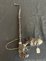 Full view of vintage German Black Forest pipe showing length and carvings