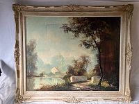 Full view of oil painting in decorative frame showing landscape scene with house and lake