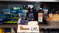 Overview of lot showing multiple Ziploc bags, Clorox cleaner, isopropyl alcohol and clothespins