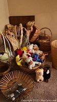 Overall assortment of wicker baskets and plush toys grouped on carpeted floor