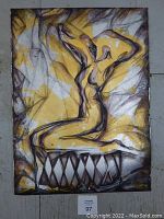 Full view of the large mixed media serigraph on paper depicting a stretching nude figure in abstract style with yellow watercolor and silver leaf accents.
