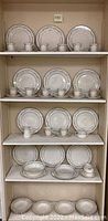 Full shelving display of all Gorham Rondelle pieces.