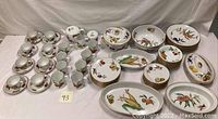Full view of all china pieces arranged on table