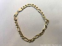 Entire bracelet laid flat to show length and overall condition