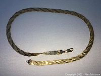 Full chain laid out showing clasp and overall style