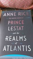 Front cover of the book showing title 'Prince Lestat and the Realms of Atlantis' and author name 'Anne Rice' with copyright 2022 visible.