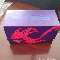 Purple collector box featuring red Eternatus artwork and Darkness Ablaze branding from Pokemon Trading Card Game.