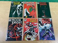 Six Marvel Comics Moon Knight issues displayed in two rows, in clear plastic sleeves showing cover art and arrangement.
