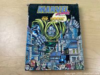 Cover of the Lands of Doctor Doom campaign book showing Doctor Doom looming over a city scene with various characters at the bottom.