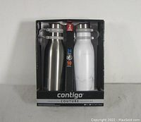 Front view of boxed set showing Satin Grey and White Marble Contigo Couture water bottles in black packaging with brand and product details.