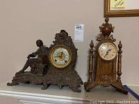 Shelf shot showing both clocks side by side