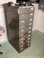 Front view of cabinet showing all ten drawers and top surface