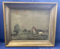 Full view of framed oil on board landscape painting showing rural scene with buildings and trees in muted colors.