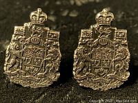 Front view of the Royal Canadian Mint crest detailed on sterling silver cufflink.