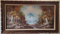 Full view of oil on canvas painting with natural landscape scene including trees and mountain in background, framed.