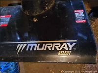 Close-up of Murray Select logo on front housing