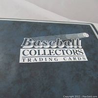 Close-up of binder cover labeled 'Baseball Collectors Trading Cards' showing the collectible storage binder.