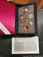 Open case displaying the 1993 Canada silver proof coin set with 7 coins arranged in foam padding, including special edition dollar and standard coins.