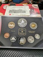 1998 Canadian Silver Proof Coin Set in black display case showing all coins and a certificate booklet in background.