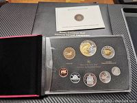 Full set displayed in black Royal Canadian Mint box including pamphlet with information about the set