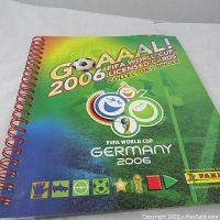 Cover of the spiral-bound collector's album for 2006 FIFA World Cup licensed soccer cards.