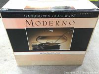 Box front showing the packaged punch bowl set with image of bowl, cups and ladle