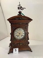 Front view of entire clock on plain background