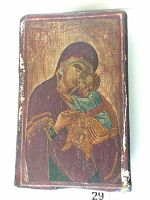 Full view of the hand-painted Madonna and Child on a wood panel with visible paint wear and chipping along edges.