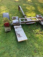 Rear loading ramp and frame showing KarTote mudflap and tail light