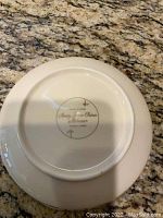 Underside of a single bowl showing Mikasa Ivory bone china branding mark