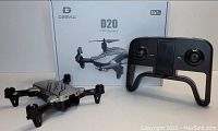 DeerC D20 drone, remote controller, and branded box displayed together