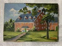Front view of the miniature painting featuring the red-brick building under blue sky with greenery, signed PHL in lower right corner.