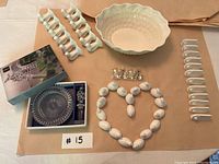 Overview of the entire set including salt and pepper shakers arranged in heart shape, place card holders, napkin holders, large dish and boxed cake serving set.