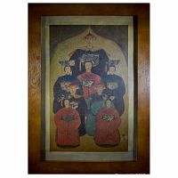 Front view of large framed ancestral oil painting showing figures and frame.