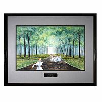 Frontal image showing the watercolor painting of geese on a path framed in a dark wood frame with grey matte and a plaque below the painting.