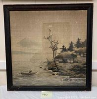 Full front view of the framed watercolor on silk showing the sea, fisher folk in a boat, trees, and traditional houses along the shoreline.