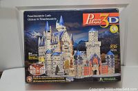 Front of Puzzle 3D box showing Neuschwanstein Castle artwork, piece count and branding
