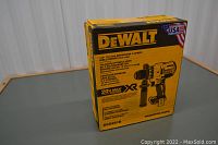 Sealed yellow and black DEWALT box labelled 20V MAX XR brushless 3-speed 1/2 in. drill driver, model DCD991B.