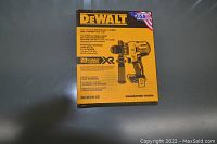 Front of DeWalt DCD991B box on gray surface