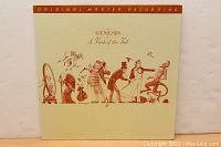 Front cover of LP showing 'A Trick of the Tail' album by Genesis with Original Master Recording text at top
