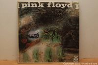 Front cover of Pink Floyd 'A Saucerful of Secrets' vinyl LP showing psychedelic art and band name