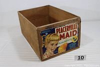 Angled front side view showing the vintage Placerville Maid colorful label with girl and Bartletts pear graphic.