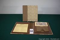 Open 'Cards and Viewer' book with viewer held upright and stereoview cards inserted and partially visible.