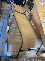 Two brown metal frame adjustable lounge chairs with beige mesh fabric seats and backrests, shown from above and side angles.