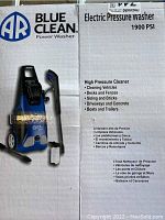 Sealed box showing Blue Clean branding and product details, including 1900 PSI rating.