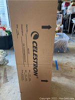 Box of Celestron telescope showing brand, item number, and product description Printed on the box: Tel PowerSeeker 70, 1 PC, gross weight 9.5 kgs, net weight 8.7 kgs.