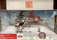Front view of the toy set box showing X-Wing Fighter model alongside Poe Dameron figure inside original packaging.