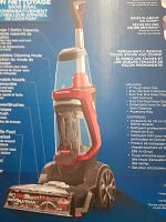 Full-box image showing Bissell ProHeat Revolution upright carpet cleaner packaging