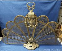 Screen fully opened showing fan-shaped panels