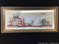 Full view of the framed watercolor painting showing the entire piece, rustic golden frame, and glass front.